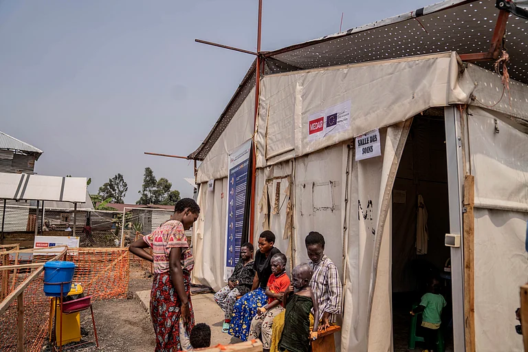 Children suffering from mpox wait for a treatment at a clinic in Munigi, eastern Congo, Monday, Aug. 19, 2024 - AP